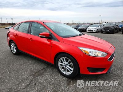 Czwarte zdjęcie samochodu z boku: 2016 FORD FOCUS SE VIN:1FADP3F28GL338381 - miniatura