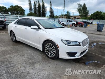 Czwarte zdjęcie samochodu z boku: 2017 LINCOLN MKZ VIN:3LN6L5CC2HR664649 - miniatura