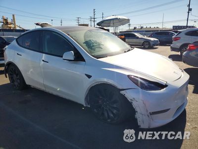 Czwarte zdjęcie samochodu z boku: 2022 TESLA MODEL Y VIN:7SAYGDEF0NF440332 - miniatura