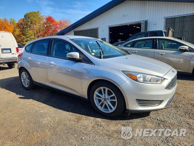 Czwarte zdjęcie samochodu z boku: 2018 FORD FOCUS SE VIN:1FADP3K21JL233789 - miniatura