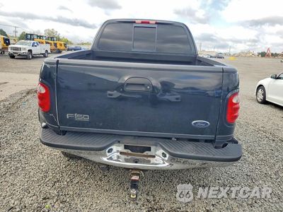 Zdjęcie 6 z 12 samochodu: 2001 FORD F150 SUPERCREW VIN:1FTRW08L11KE05651 - miniatura