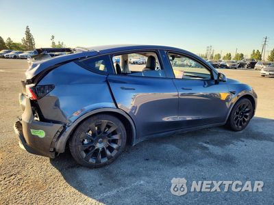 Trzecie zdjęcie samochodu z tyłu: 2022 TESLA MODEL Y VIN:7SAYGDEE3NF371935 - miniatura