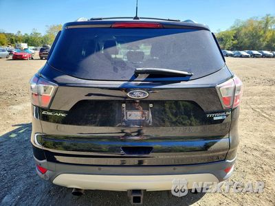 Zdjęcie 6 z 13 samochodu: 2017 FORD ESCAPE TITANIUM VIN:1FMCU9J98HUA07135 - miniatura