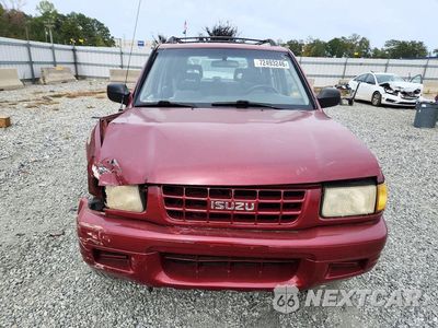Piąte zdjęcie samochodu w środku: 1999 ISUZU RODEO S VIN:4S2CK58W5X4346954 - miniatura
