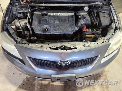 Zdjęcie 11 z 12 samochodu: 2009 TOYOTA COROLLA LE VIN:1NXBU40E09Z165063 - miniatura