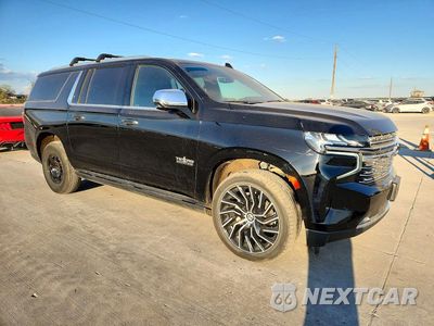 Czwarte zdjęcie samochodu z boku: 2021 CHEVROLET SUBURBAN K1500 PREMIER VIN:1GNSKFKD6MR217020 - miniatura
