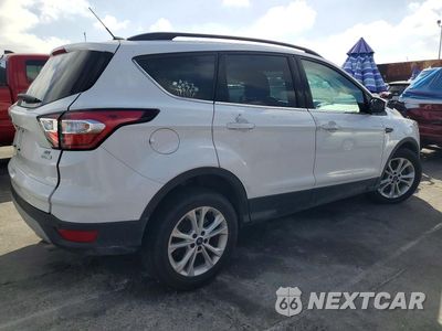 Trzecie zdjęcie samochodu z tyłu: 2017 FORD ESCAPE SE VIN:1FMCU0GD1HUC63558 - miniatura