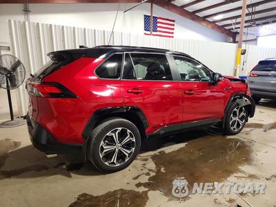 Trzecie zdjęcie samochodu z tyłu: 2024 TOYOTA RAV4 PRIME XSE VIN:JTMFB3FV7RD233288 - miniatura