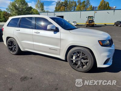 Czwarte zdjęcie samochodu z boku: 2018 JEEP GRAND CHEROKEE TRACKHAWK VIN:1C4RJFN98JC318673 - miniatura