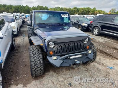 Czwarte zdjęcie samochodu z boku: 2013 JEEP WRANGLER UNLIMITED SPORT VIN:1C4HJWDGXDL617047 - miniatura