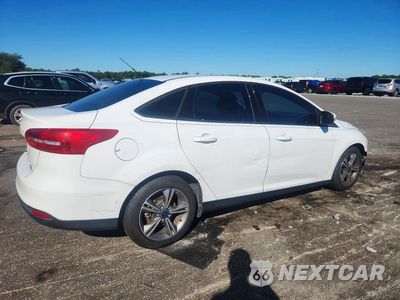 Trzecie zdjęcie samochodu z tyłu: 2016 FORD FOCUS SE VIN:1FADP3FE8GL385713 - miniatura