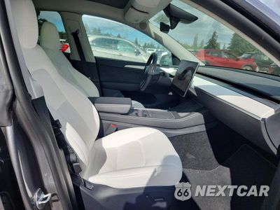 Zdjęcie 7 z 13 samochodu: 2024 TESLA MODEL Y VIN:7SAYGDEE5RF193435 - miniatura