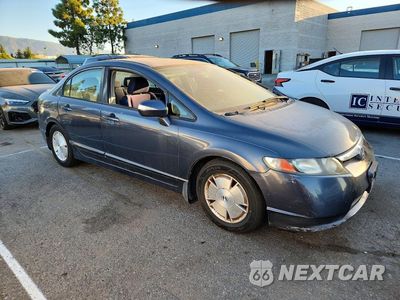 Czwarte zdjęcie samochodu z boku: 2006 HONDA CIVIC HYBRID VIN:JHMFA36296S012094 - miniatura