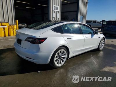 Trzecie zdjęcie samochodu z tyłu: 2022 TESLA MODEL 3 VIN:5YJ3E1EA7NF371638 - miniatura
