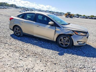 Czwarte zdjęcie samochodu z boku: 2017 FORD FOCUS SE VIN:1FADP3FEXHL266076 - miniatura
