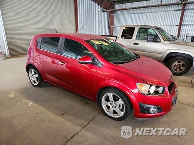Czwarte zdjęcie samochodu z boku: 2013 CHEVROLET SONIC LTZ VIN:1G1JE6SGXD4207277 - miniatura