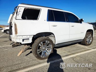 Trzecie zdjęcie samochodu z tyłu: 2019 CHEVROLET TAHOE K1500 LT VIN:1GNSKBKC5KR142565 - miniatura