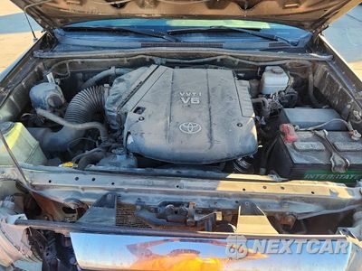Zdjęcie 12 z 13 samochodu: 2014 TOYOTA TACOMA V6 VIN:3TMLU4EN7EM159745 - miniatura