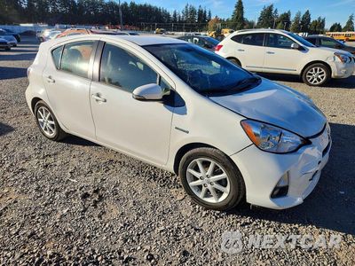 Czwarte zdjęcie samochodu z boku: 2012 TOYOTA PRIUS C FOUR VIN:JTDKDTB39C1512697 - miniatura