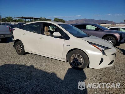 Czwarte zdjęcie samochodu z boku: 2017 TOYOTA PRIUS THREE VIN:JTDKARFU4H3544533 - miniatura