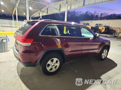 Trzecie zdjęcie samochodu z tyłu: 2016 JEEP GRAND CHEROKEE LAREDO VIN:1C4RJFAG7GC427087 - miniatura