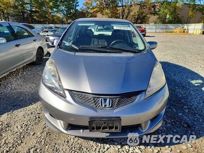 Piąte zdjęcie samochodu w środku: 2009 HONDA FIT SPORT VIN:JHMGE884X9S029298 - miniatura