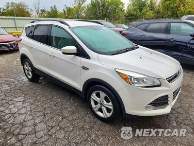 Czwarte zdjęcie samochodu z boku: 2016 FORD ESCAPE SE VIN:1FMCU0GX1GUB69785 - miniatura