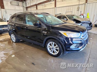 Czwarte zdjęcie samochodu z boku: 2018 FORD ESCAPE SE VIN:1FMCU0GD6JUD52323 - miniatura