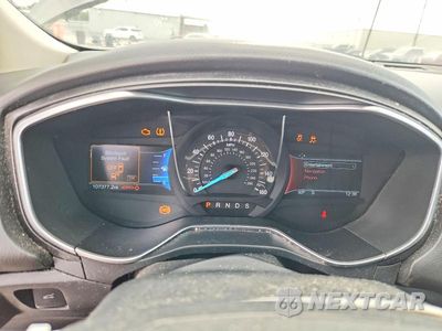 Zdjęcie 9 z 13 samochodu: 2017 FORD FUSION TITANIUM VIN:3FA6P0K91HR117086 - miniatura