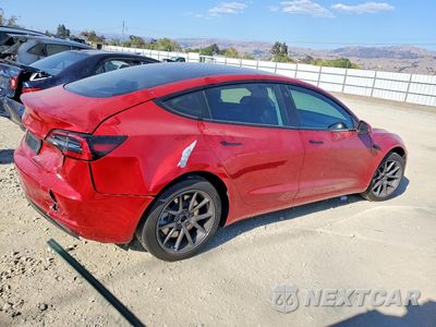 Trzecie zdjęcie samochodu z tyłu: 2023 TESLA MODEL 3 VIN:5YJ3E1EA5PF552501 - miniatura