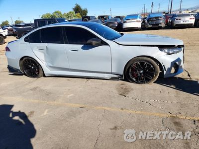 Czwarte zdjęcie samochodu z boku: 2026 BMW M5 VIN:WBS83FK02TCV22294 - miniatura