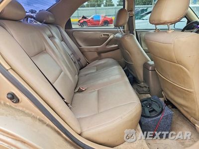Zdjęcie 10 z 12 samochodu: 2000 TOYOTA CAMRY LE VIN:JT2BG22K5Y0530466 - miniatura