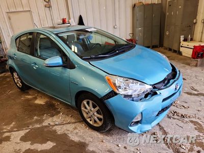 Czwarte zdjęcie samochodu z boku: 2014 TOYOTA PRIUS C FOUR VIN:JTDKDTB38E1073866 - miniatura