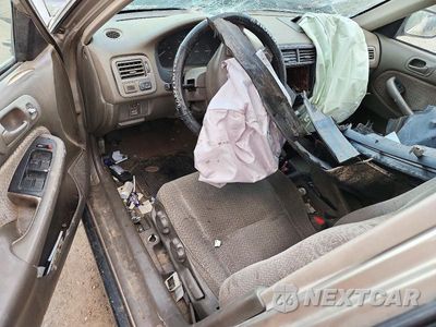 Zdjęcie 8 z 12 samochodu: 2000 HONDA CIVIC LX VIN:1HGEJ657XYL070466 - miniatura