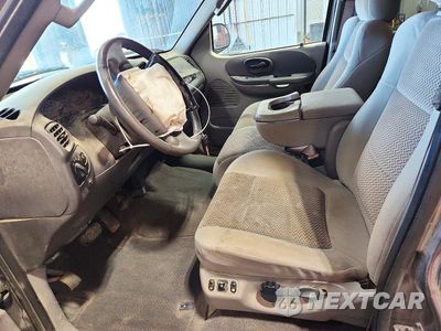 Zdjęcie 7 z 12 samochodu: 2002 FORD F150 SUPERCREW VIN:1FTRW08L72KC33210 - miniatura