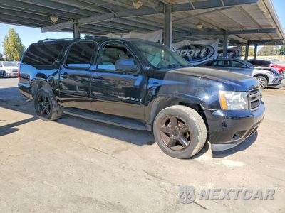 Czwarte zdjęcie samochodu z boku: 2007 CHEVROLET SUBURBAN K1500 VIN:1GNFK16367J161914 - miniatura