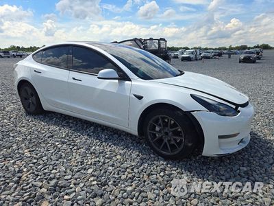 Czwarte zdjęcie samochodu z boku: 2023 TESLA MODEL 3 VIN:5YJ3E1EA7PF459804 - miniatura