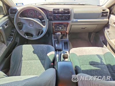 Zdjęcie 8 z 12 samochodu: 2002 ISUZU RODEO S VIN:4S2CK58WX24316552 - miniatura