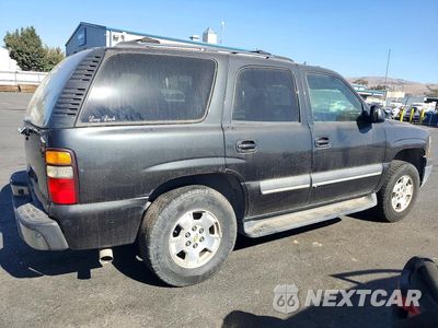 Trzecie zdjęcie samochodu z tyłu: 2004 CHEVROLET TAHOE K1500 VIN:1GNEK13T34R166596 - miniatura