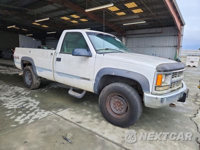 Czwarte zdjęcie samochodu z boku: 1999 CHEVROLET GMT-400 K2500 VIN:1GCGK24J7XF049002 - miniatura