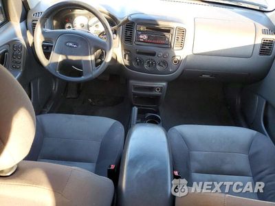 Zdjęcie 8 z 13 samochodu: 2003 FORD ESCAPE XLS VIN:1FMYU92123KC57912 - miniatura