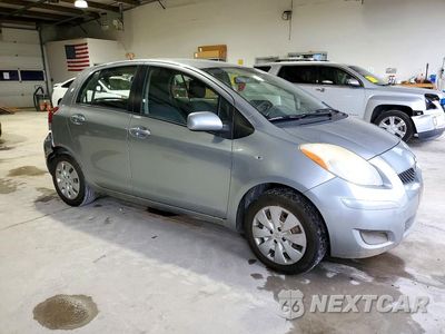 Czwarte zdjęcie samochodu z boku: 2010 TOYOTA YARIS BASE VIN:JTDKT4K31A5320690 - miniatura