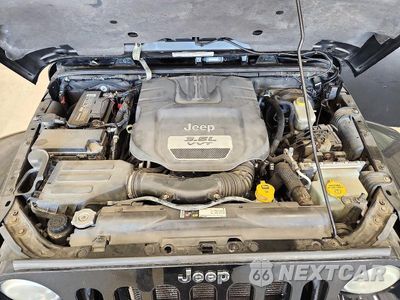 Zdjęcie 12 z 13 samochodu: 2012 JEEP WRANGLER UNLIMITED SAHARA VIN:1C4HJWEG4CL240891 - miniatura