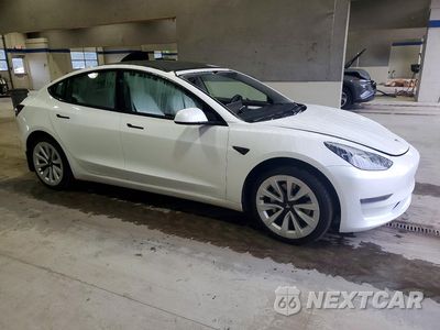 Czwarte zdjęcie samochodu z boku: 2023 TESLA MODEL 3 VIN:5YJ3E1EA7PF492026 - miniatura