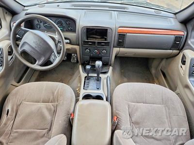 Zdjęcie 8 z 13 samochodu: 1999 JEEP GRAND CHEROKEE LAREDO VIN:1J4GW58S1XC680154 - miniatura