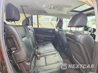 Zdjęcie 11 z 14 samochodu: 2013 HONDA PILOT TOURING VIN:5FNYF4H98DB008723 - miniatura