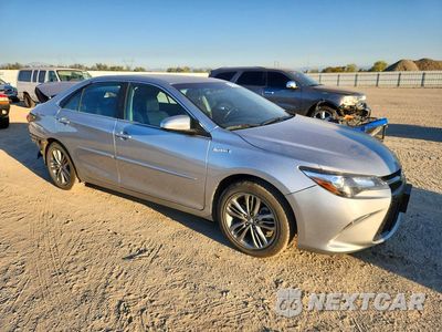 Czwarte zdjęcie samochodu z boku: 2016 TOYOTA CAMRY HYBRID SE VIN:4T1BD1FKXGU188245 - miniatura