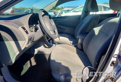 Zdjęcie 7 z 13 samochodu: 2009 TOYOTA COROLLA LE VIN:1NXBU40E99Z023892 - miniatura