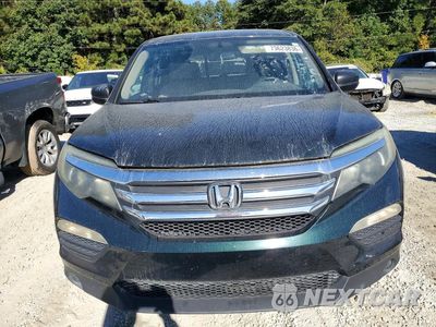 Piąte zdjęcie samochodu w środku: 2016 HONDA PILOT LX VIN:5FNYF5H12GB030995 - miniatura