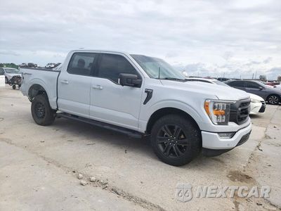 Czwarte zdjęcie samochodu z boku: 2022 FORD F150 SUPERCREW VIN:1FTEW1C52NKD06873 - miniatura